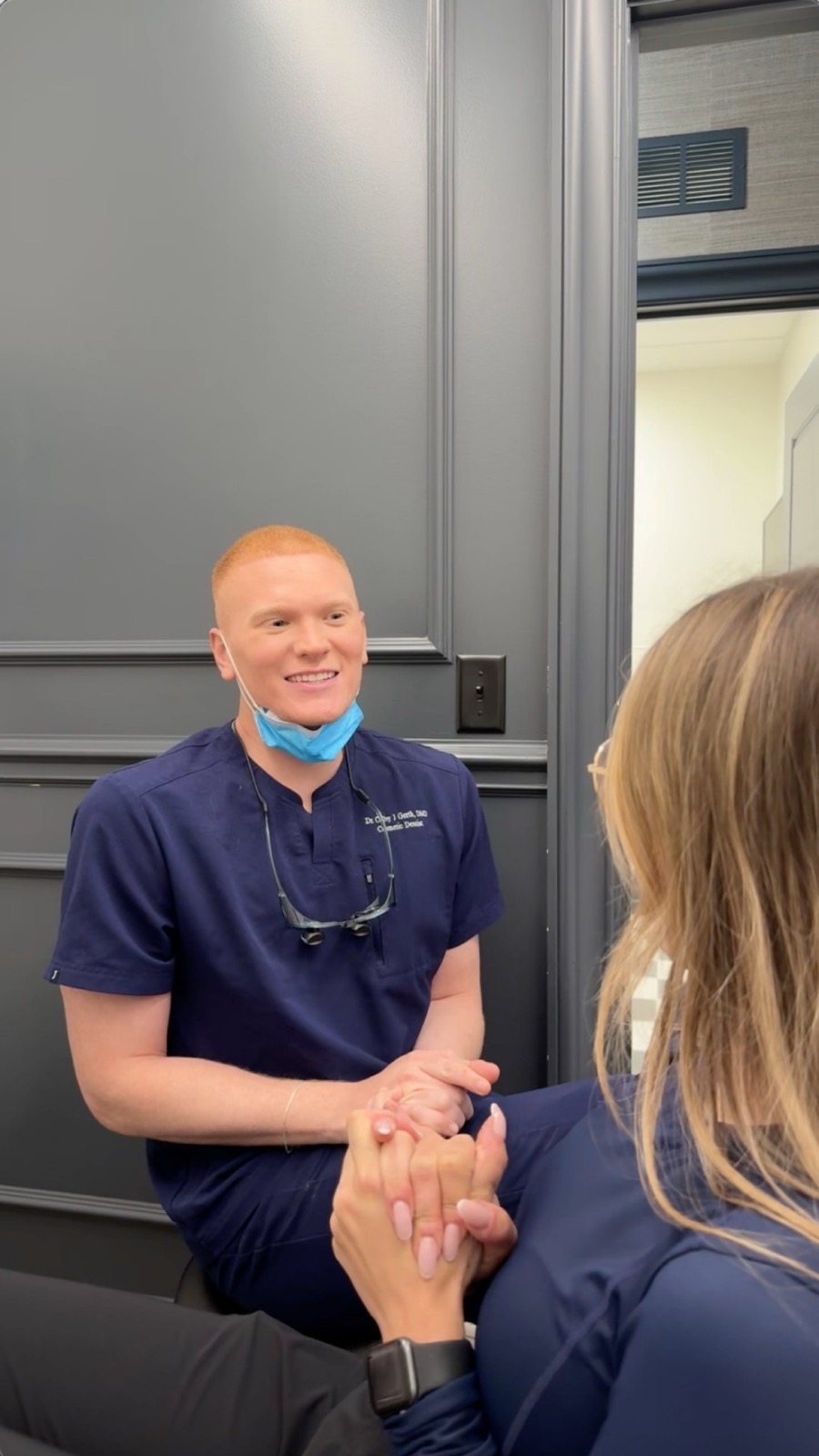 Dr. Colby talking with a patient at Pearl