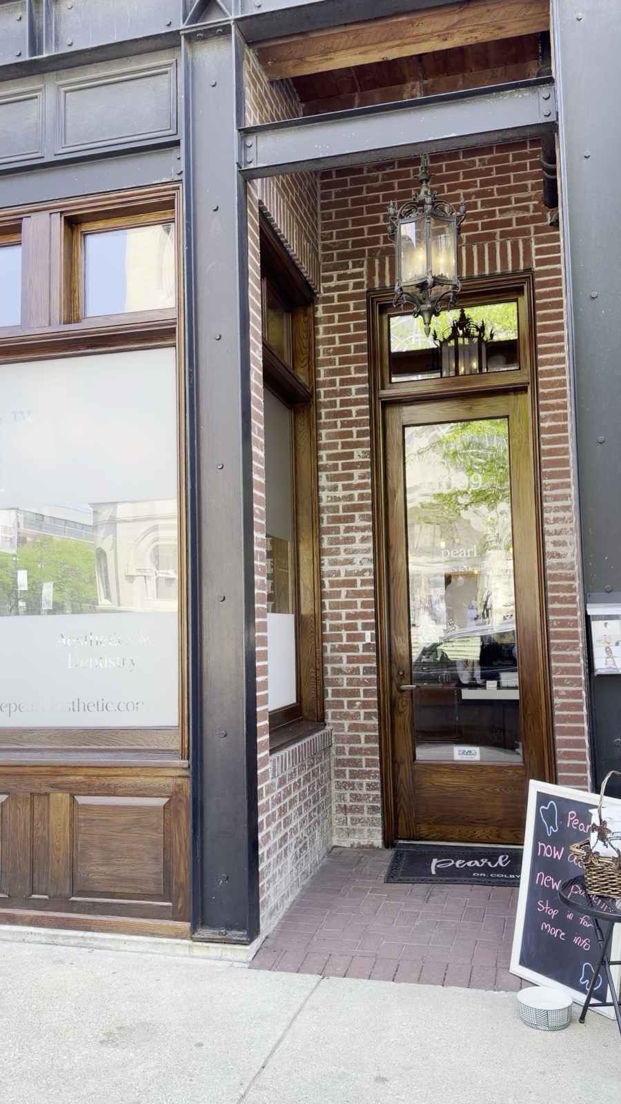 The front door of Pearl, with the sign out front