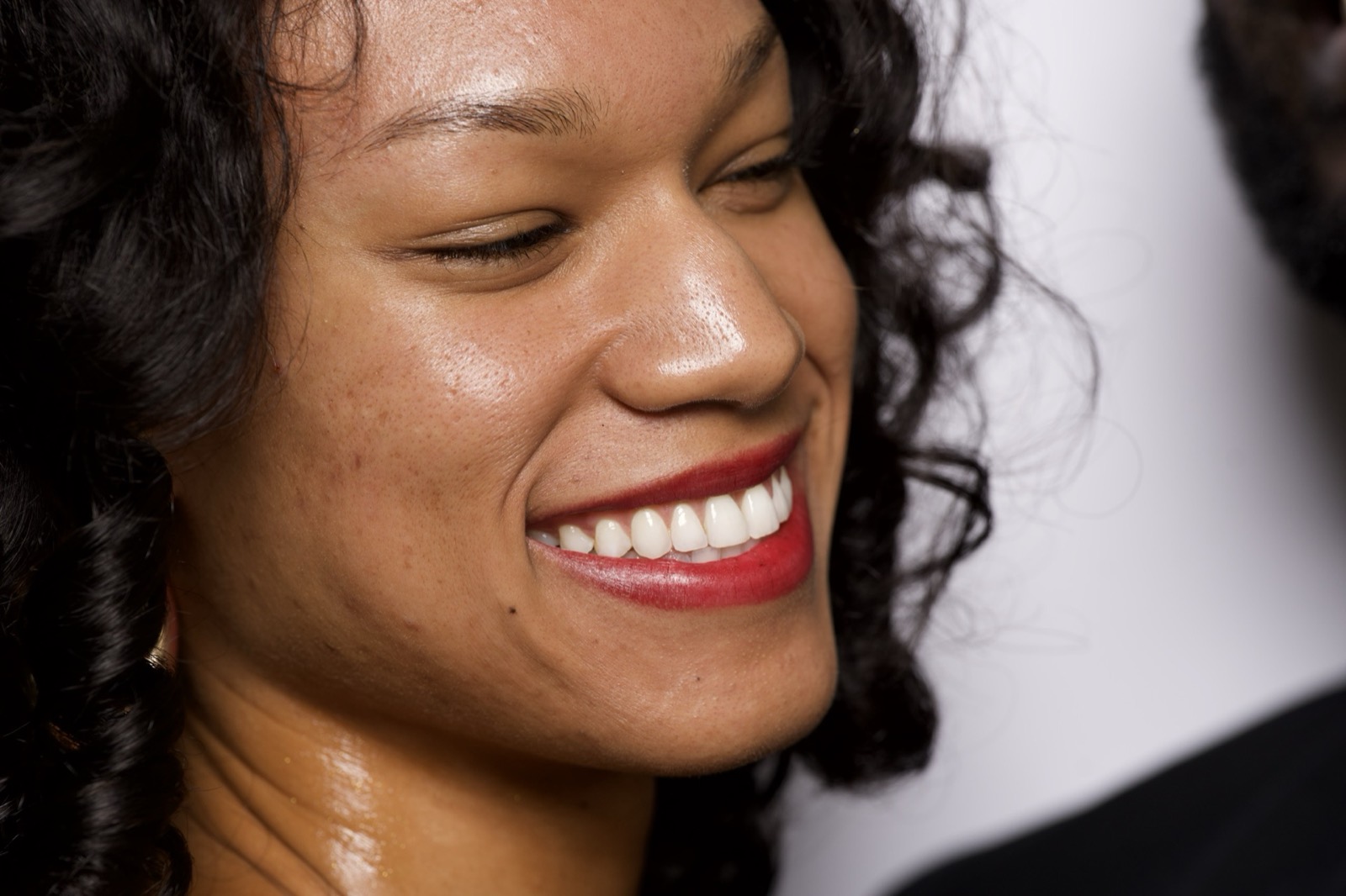 A woman smiling